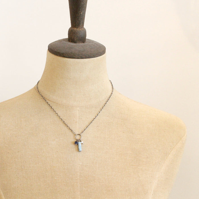 A mannequin wearing the mirage sydney charm necklace