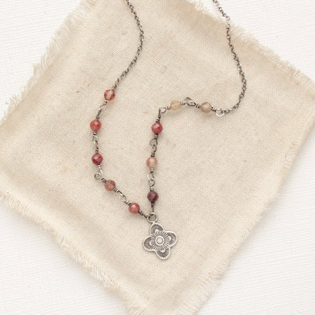 The andesine mini talara necklace styled on tan linen