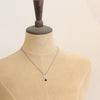 A mannequin wearing the black tourmaline jolie necklace