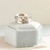 The galaxy spinner ring styled on a velvet box