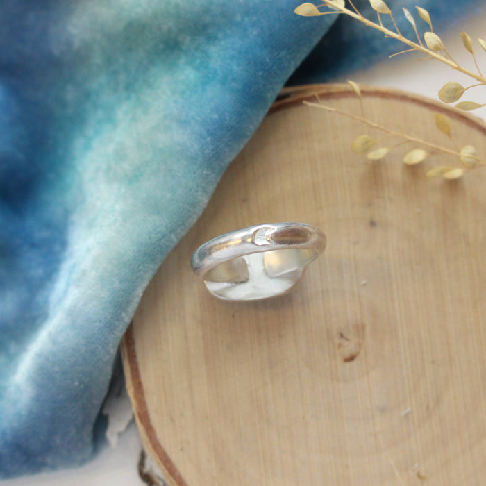 The backside of the kyanite ring showing the little moon stamp
