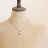 A mannequin wearing the lepidolite jolie necklace