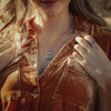 A model wearing the pakal turquoise trio necklace