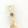 The back to the garden stacking ring styled on tan linen