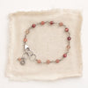 The talara sun andesine bracelet styled on tan linen