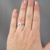 The little sun mixed metal ring styled on a hand to show size reference