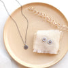 The rustic sun set styled on a tan plate with linen and dried grass