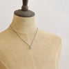 A mannequin wearing the rustic sun necklace